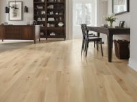 Maple luxury vinyl plank in clean, light finish