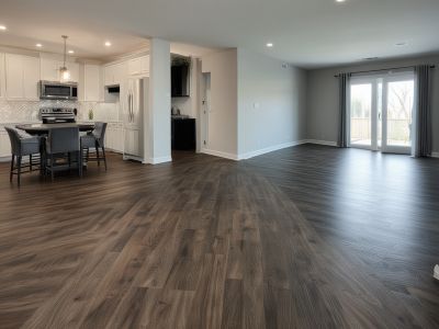 Open concept living space with vinyl plank flooring, seamless installation connecting multiple rooms