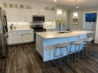 Kitchen after luxury vinyl plank installation, modern and beautiful transformation